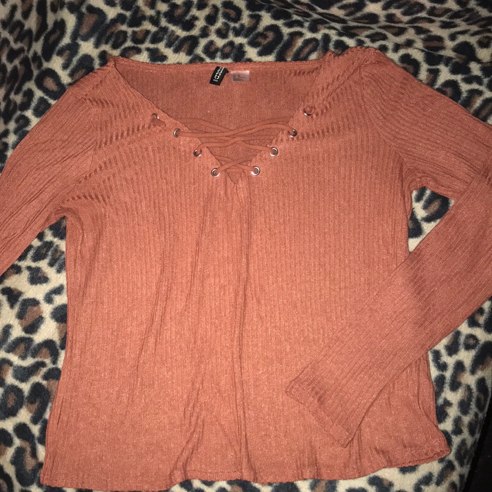 Lace up long sleeve top